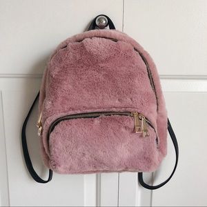 Pink / blush Faux Fur backpack similar to Zara